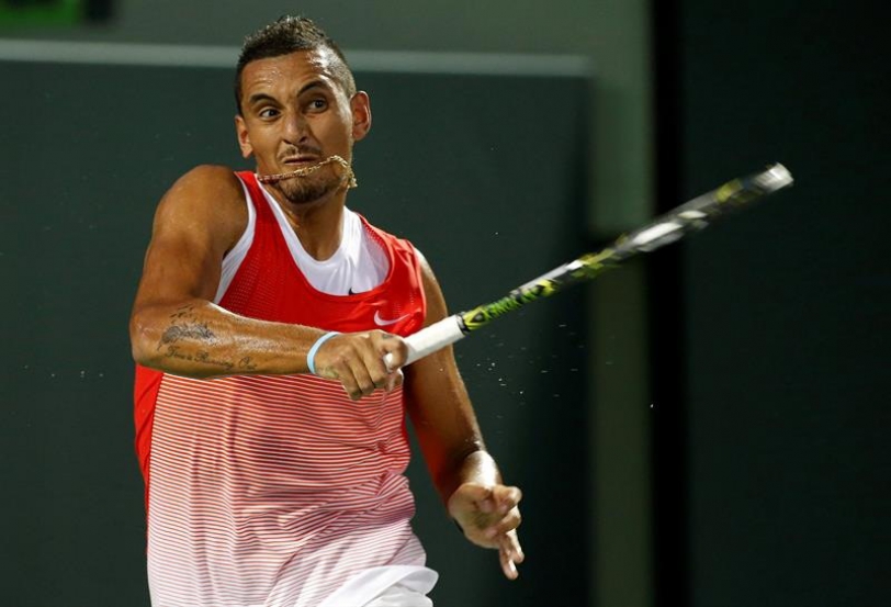 Nick Kyrgios de Australia ante Milos Raonic de Canadá hoy, jueves 31 de marzo de 2016, durante un juego del Abierto de Tenis de Miami que se disputa en Key Biscayne, Miami, Florida (Estados Unidos). EFE/RHONA WISE