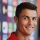 El delantero de la selección de fútbol de Portugal Cristiano Ronaldo sonríe durante una rueda de prensa El delantero de la selección de fútbol de Portugal Cristiano Ronaldo sonríe durante una rueda de prensa