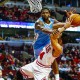 Chicago Bulls guard DJ Augustin (B) is fouled by Denver Nuggets guard Aaron Brooks (T) as he attempts to shoot in the second half of their NBA Chicago Bulls guard DJ Augustin (B) is fouled by Denver Nuggets guard Aaron Brooks (T) as he attempts to shoot in the second half of their NBA